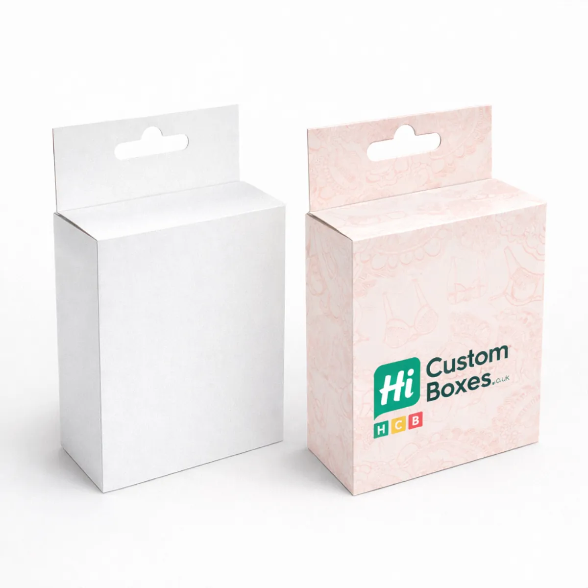 Two vertical hanging retail cartons with euro slots- one plain white and one patterned pink-